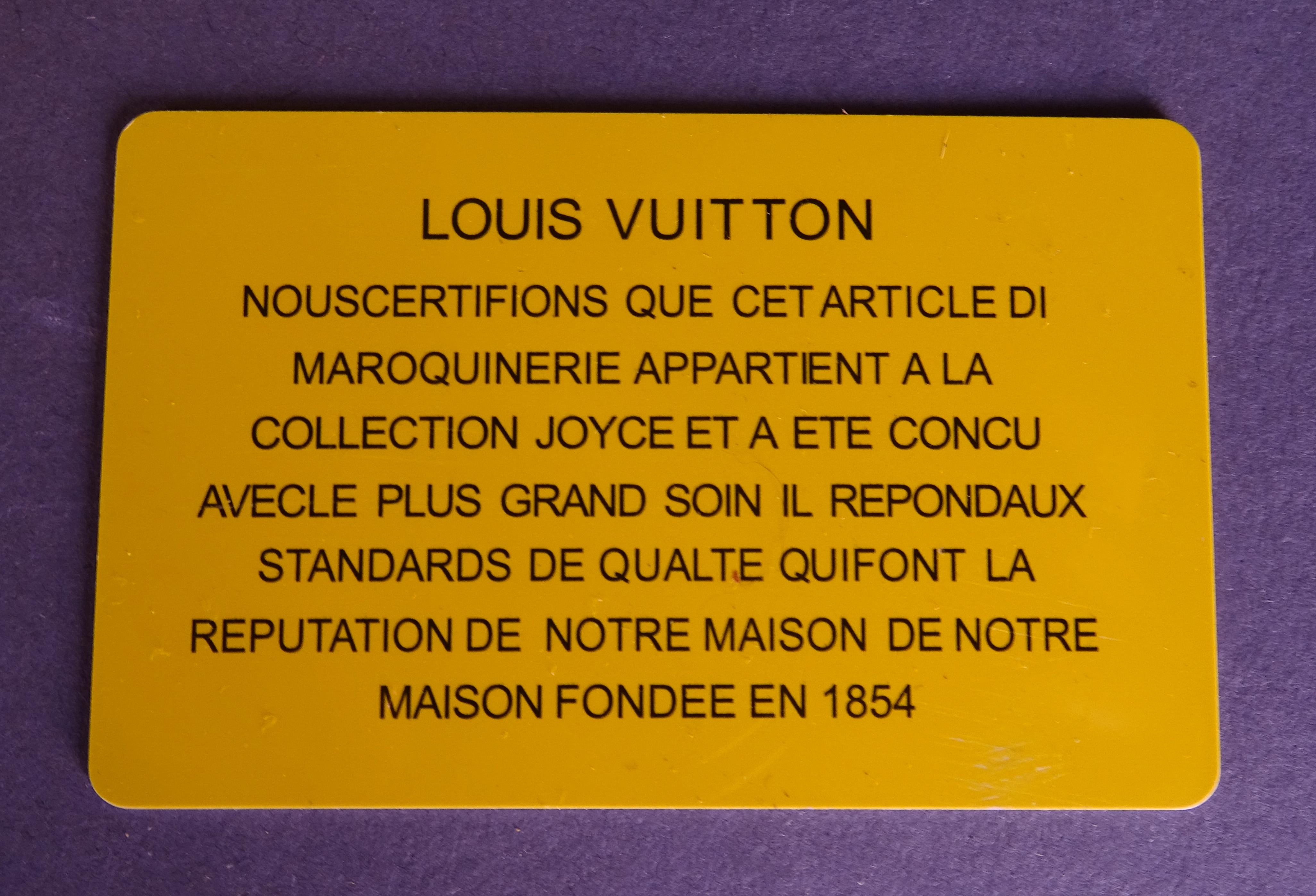 Mode : Sac Lockit MM LOUIS VUITTON France veau python exotique