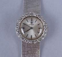 Bijou : Montre bracelet de dame OMEGA en or blanc 18K cadran serti de diamants mvt à remontoir (en état)