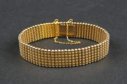 Bijou : Bracelet en or jaune 18K avec chaine de sécurité