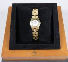Bijou : Montre bracelet de dame BAUME et MERCIER modèle Linéa en or jaune 18K cadran en nacre mouvement à quartz (en état)