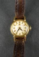 Bijou : Montre bracelet de dame OMEGA en or 18K mvt à remontoir (en état) avec le bracelet + fermoir en plaqué d'origine