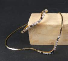 Bijou : Parure (Collier et bracelet) en or jaune 18K sertie de diamants et de saphirs