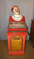 Objet : Jeu de fête foraine / café - Clown rieur - tête pivotante (Ds l'état , mqe) 1ère moitié 20eS monté sur un meuble