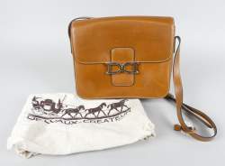 Mode : Sac à main DELVAUX bourgogne à bandoullière dit crossbody en cuir (traces griffes)