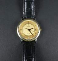 Bijou : Montre bracelet d'homme OMEGA De Ville mvt à Quartz (En état) en acier lunette métal doré bracelet cuir (usures)