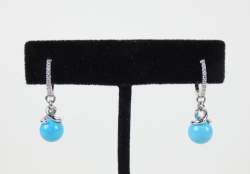 Bijou: Paire de boucles d'oreilles en or blanc 18K sertie de diamants pour env.