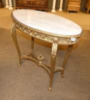 Meuble : Guéridon ovale doré de style dessus marbre