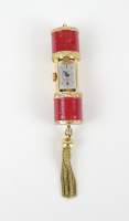 Bijou : Montre pendentif de femme CREHOR type Ermeto/ lipstick en métal doré et émail rouge boitier coulissant mouvement à remontoir (en état)