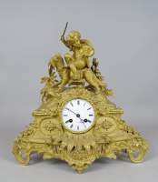 Horlogerie: horloge en bronze doré -Enfant jouant avec un chien- mvt de Paris à