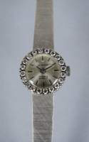 Bijou : Montre bracelet de dame LE MONDE en or blanc 18K boitier serti de diamants mouvement à remontoir (en état)