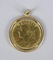 Collection : Pendentif en or jaune 18K serti d'une piece de monnaie de 20Fr OR 18K type VRENELI
