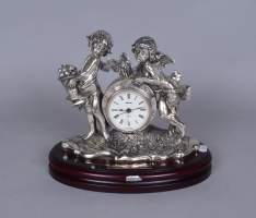 Argenterie: Pendule -angelots vendangeurs- en argent 1er titre Joyeria Salamanca