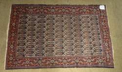 Tapis d'Orient noué main SENEH (usures)
