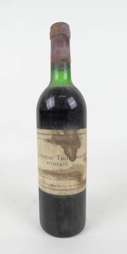 Vin : bouteille (taches étiquette) Château Trotanoy POMEROL 1975 75cl