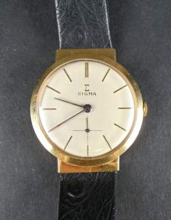 Bijou : Montre bracelet d'homme SIGMA en or jaune 18K mvt à remontoir (En état)