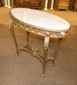 Meuble : Guéridon ovale doré de style dessus marbre