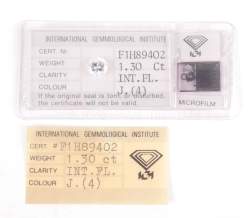 Bijou : Diamant de 1 , 30ct taille brillant rond sur papier / sous blister avec certificat IGI de 1985 pureté IF couleur J fluorescence très légère
